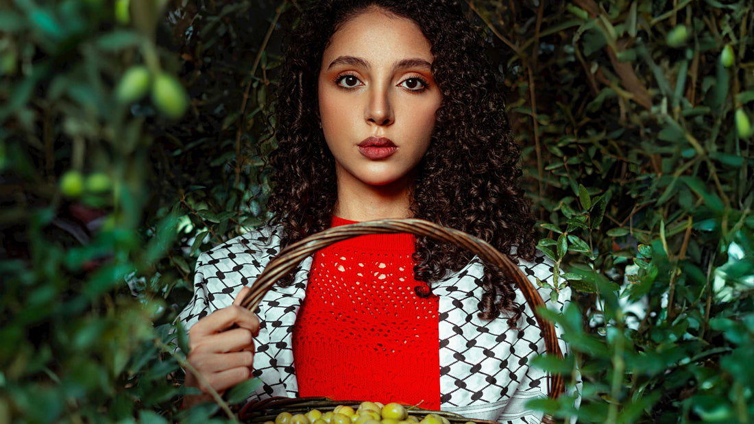 Young woman in olive grove holding a basket of green olives  pexels-khezez