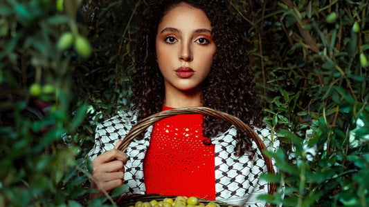 Young woman in olive grove holding a basket of green olives  pexels-khezez